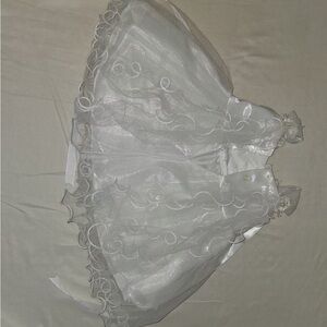 Elegant White Dress with Swirl Details